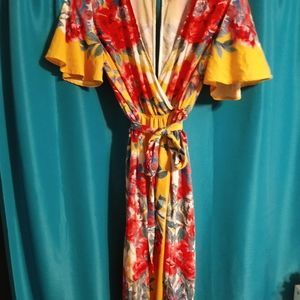 Yellow floral jumpsuit by Flying Tomato